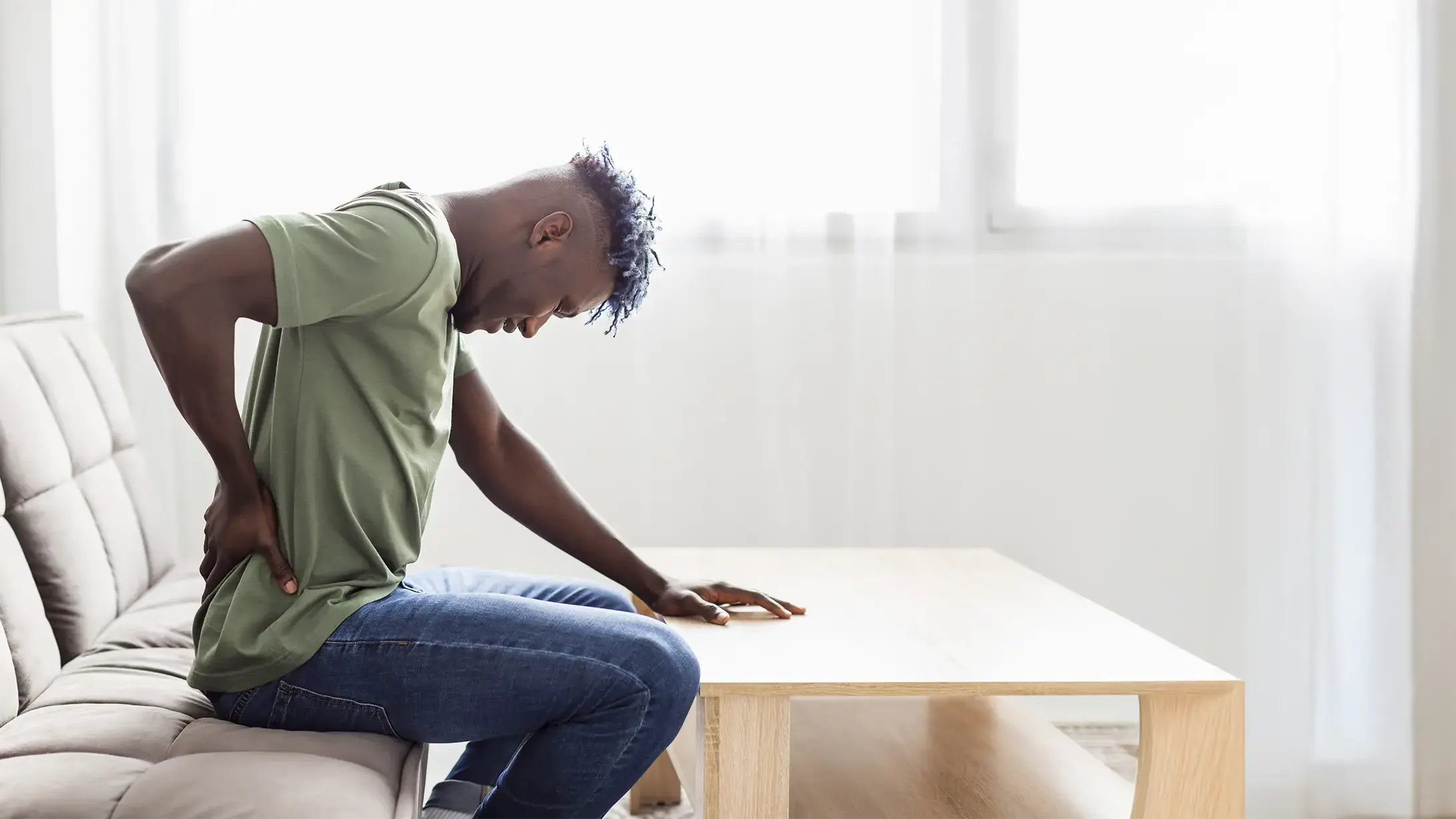 Sciatique : comprendre la douleur et le rôle de la physiothérapie douleur-homme-sciatique